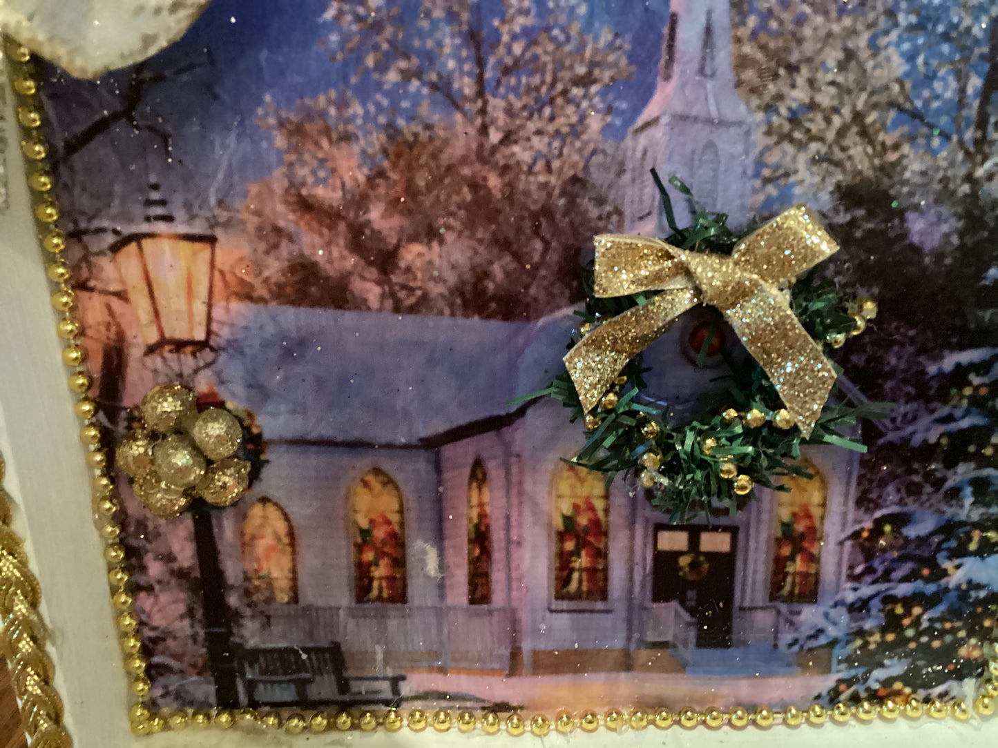 7" X 7" white and gold box with church, Christmas tree, wreath, lamppost, and gold bow